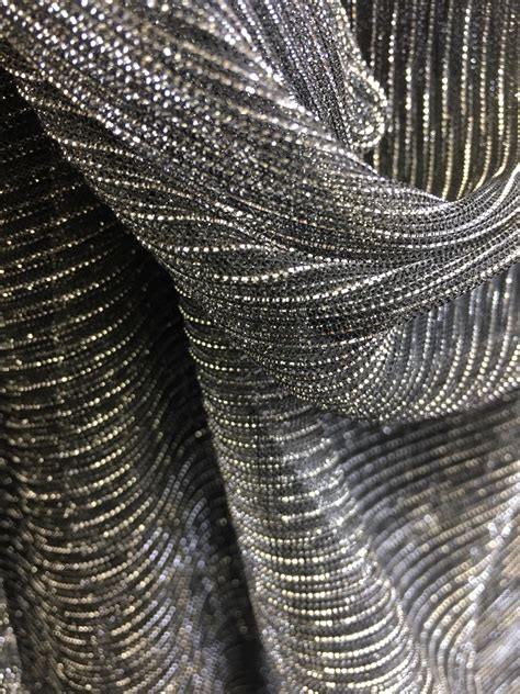 metallic silver black fabric|fabric with metallic accents.